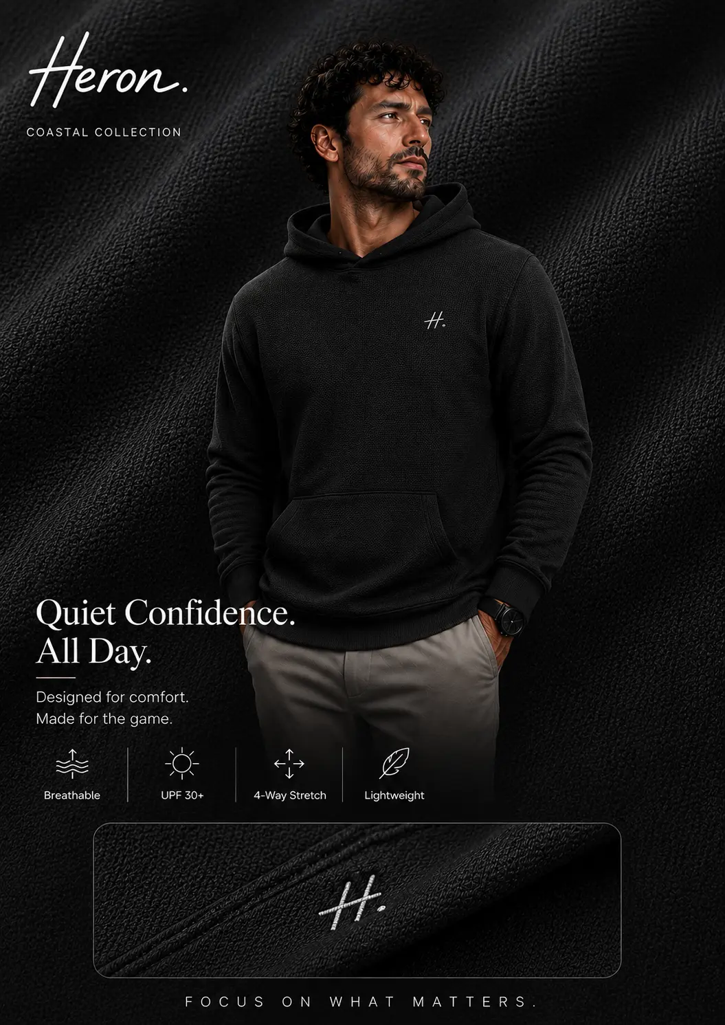 Model wearing the HERON textured performance hoodie in black