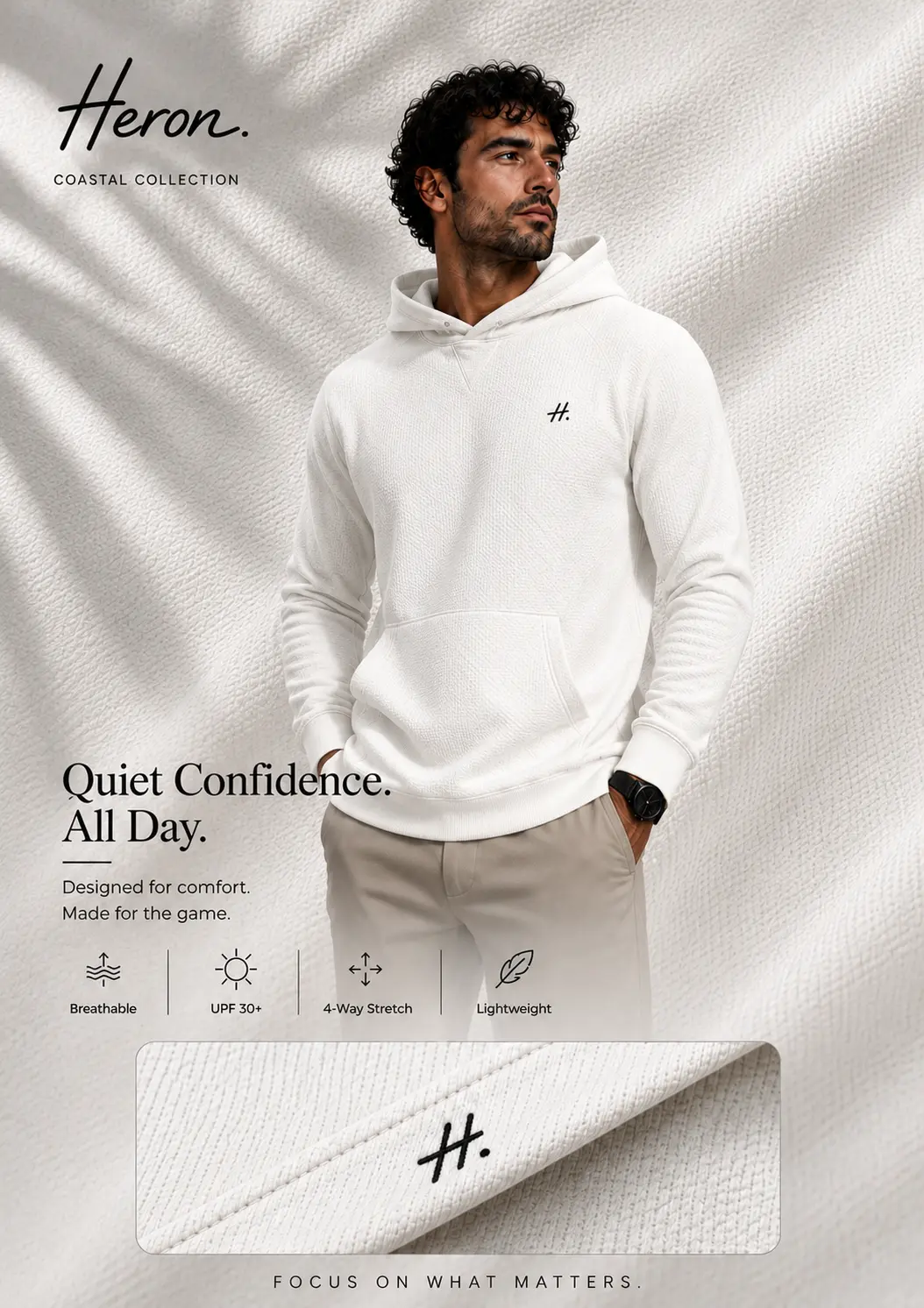 Model wearing the HERON performance hoodie in white